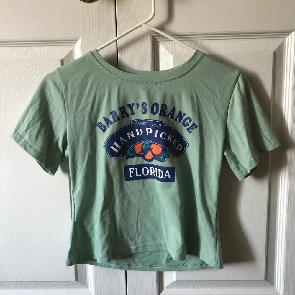 Barry’s Orange crop top